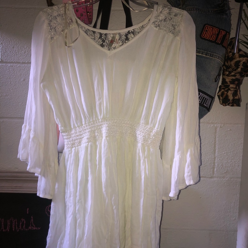 White with lace beach cover up or dress.